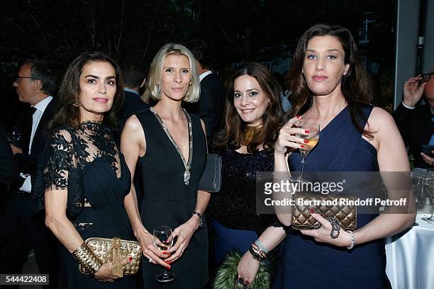 Sylvia Toledano, Helene Gateau, Hedieh Loubier and guest attend the Amfar Paris Dinner - Stars gather for Amfar during the Haute Couture Week - Held...
