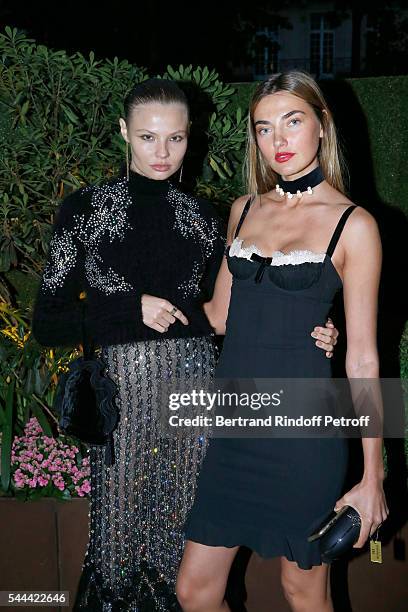 Models Magdalena Frackowiak and Alina Baikova attend the Amfar Paris Dinner - Stars gather for Amfar during the Haute Couture Week - Held at The...