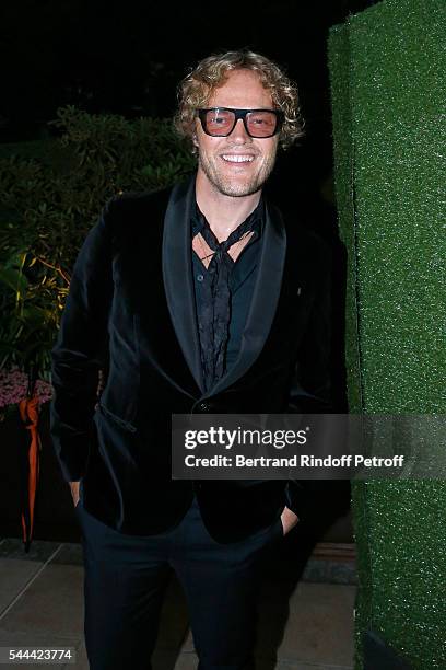 Stylist Peter Dundas attends the Amfar Paris Dinner - Stars gather for Amfar during the Haute Couture Week - Held at The Peninsula Hotel on July 3,...
