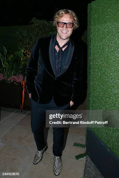 Stylist Peter Dundas attends the Amfar Paris Dinner - Stars gather for Amfar during the Haute Couture Week - Held at The Peninsula Hotel on July 3,...
