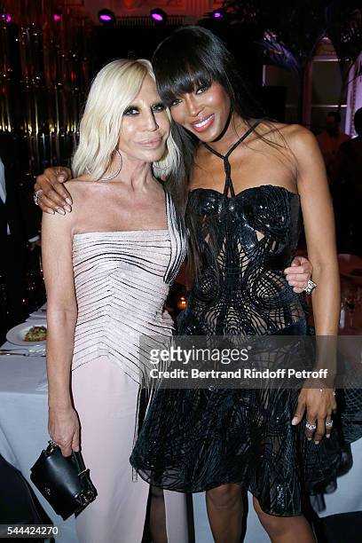 Donatella Versace and Naomi Campbell attend the Amfar Paris Dinner - Stars gather for Amfar during the Haute Couture Week - Held at The Peninsula...