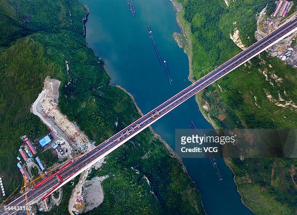 Aerial view of construction vehicles standing at the Yachi River Bridge on June 29, 2016 in Guiyang, Guizhou Province of China. The Yachi River...