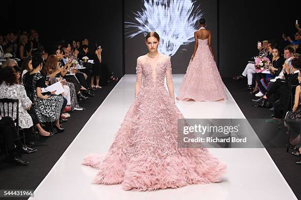 Model walks the runway for Michael Cinco during the Couturissimo Fall/Winter 2016-2017 show as part of Paris Fashion Week on July 3, 2016 in Paris,...