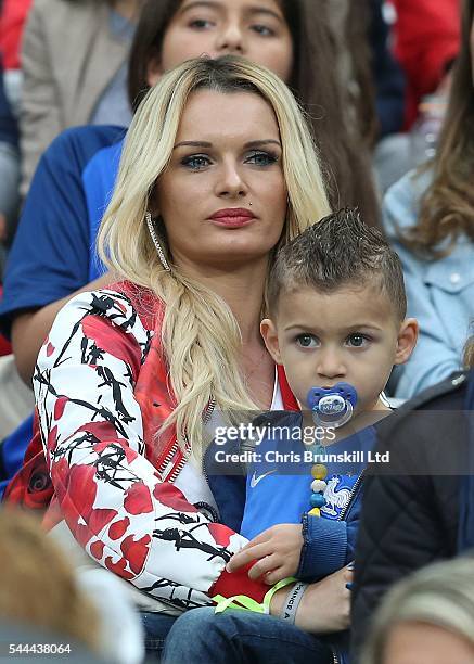 Ludivine Payet, wife of Dimitri Payet of France, looks on during the UEFA Euro 2016 Quarter Final match between France and Iceland at Stade de France...