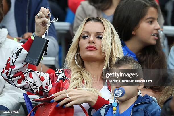 Ludivine Payet, wife of Dimitri Payet of France, looks on during the UEFA Euro 2016 Quarter Final match between France and Iceland at Stade de France...