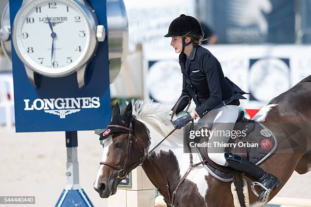 Mathilde Pinault, daughter of Francois-Henri Pinault competes at the Paris Eiffel Jumping 2016 held at Parc de Bagatelle on July 2, 2016 in Paris,...