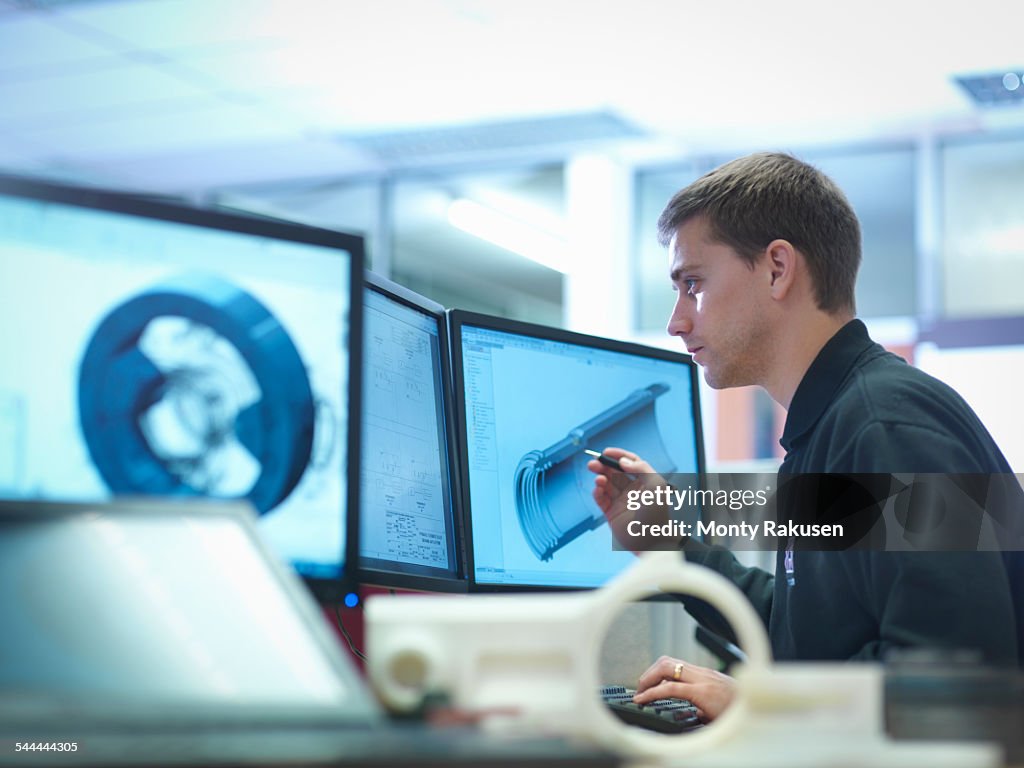 CAD designer working on engineering designs