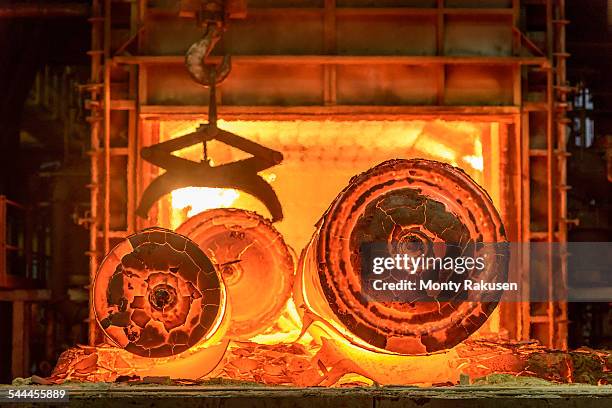 hot steel castings in furnace of steelworks - sheffield steel stock pictures, royalty-free photos & images
