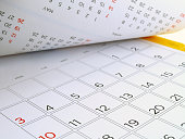 desk calendar with days and dates in July 2016