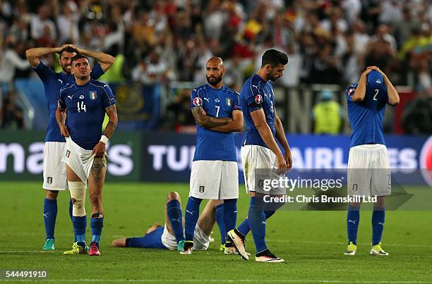 Italy look dejected following the penalty shoot out during the UEFA Euro 2016 Quarter Final match between Germany and Italy at Nouveau Stade de...