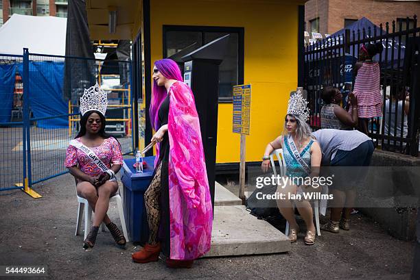 Three drag queens rest along Church Street, during the annual Gay Pride Festival on July 3, 2016 in Toronto, Ontario, Canada. Justin Trudeau made...