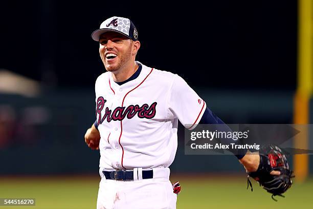 JUlLY 3: Freddie Freeman of the Atlanta Braves smiles during against the Miami Marlins at Fort Bragg Stadium on Sunday, July 3, 2016 in Fort Bragg,...