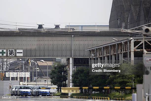 Mitsubishi Motors Corp. Vehicles sit parked at the company's Mizushima plant in Kurashiki, Okayama Prefecture, Japan, on Friday, June 17, 2016....