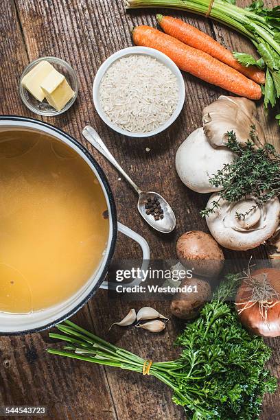 ingredients for bulgarian soup with rice, mushrooms and carrots - soup vegtables stock-fotos und bilder