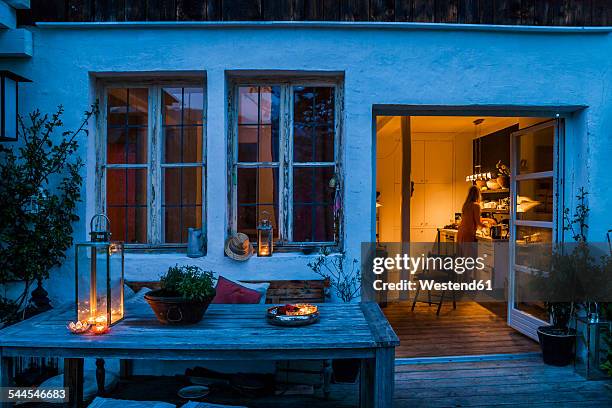 terrace at dusk with view to kitchen - open country ストックフォトと画像