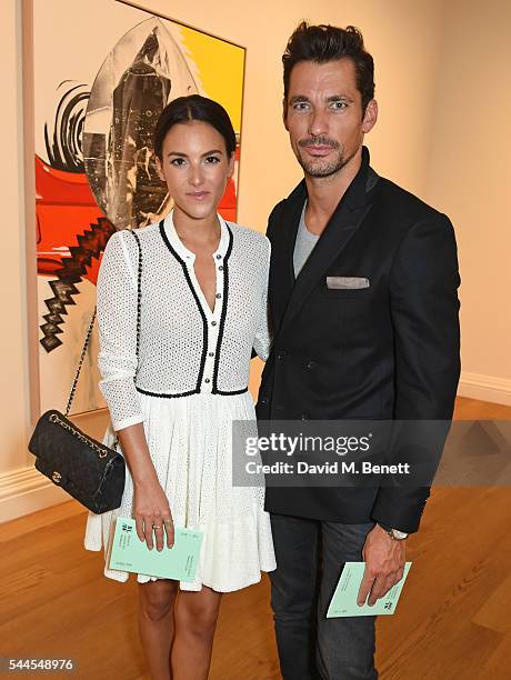 Stephanie Mendoros and David Gandy attend The Mayfair Gallery Hop to launch Brown's London Art Weekend at Messums Gallery on July 1, 2016 in London,...