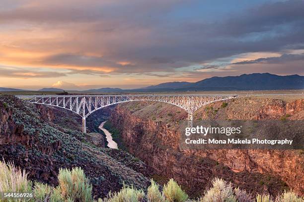 rio grande gorge bridge, taos county, new mexico - taos new mexico stock pictures, royalty-free photos & images