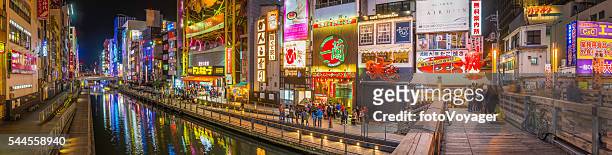 japan city nightlife neon lights crowds of shoppers dotonbori osaka - osaka prefecture stock pictures, royalty-free photos & images