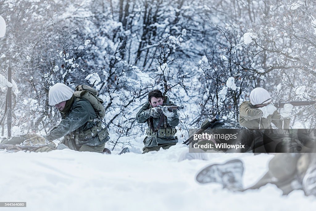 Ambushed WWII US Army Combat Soldiers Returning Enemy Fire