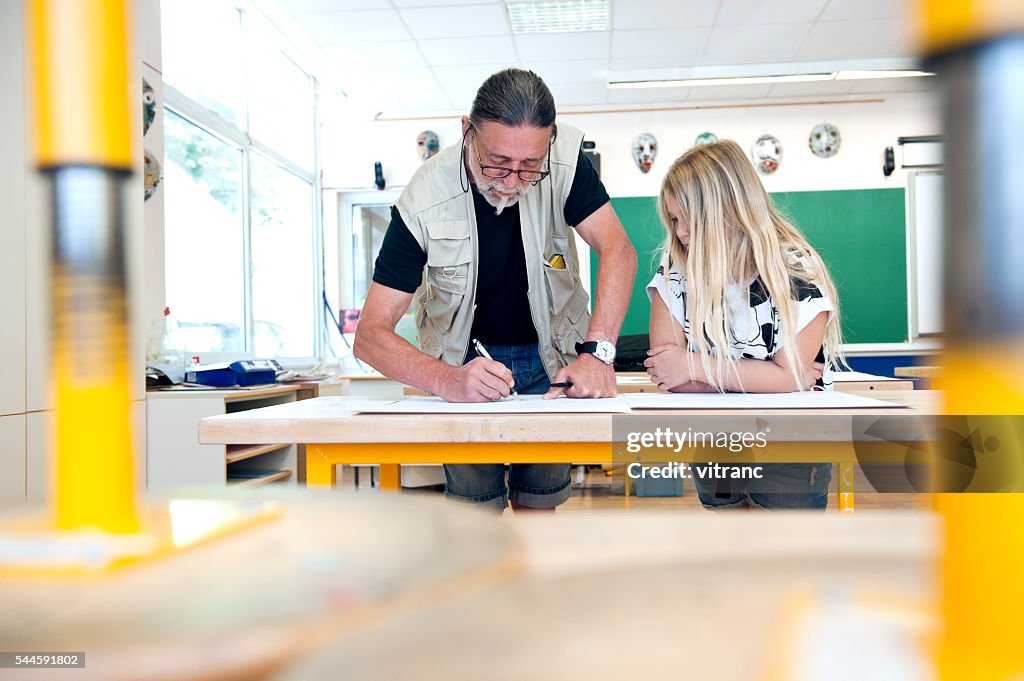 Art teacher and his pupil