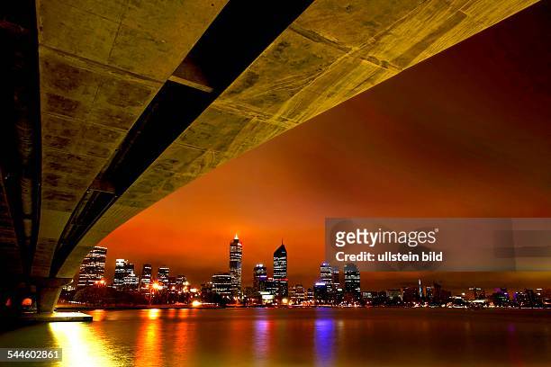 Western Australia Perth - city skyline across the Swan River from under the Narrows Bridge