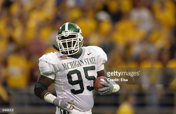 Josh Shaw of Michigan State carries the ball against Minnesota during the game at Hubert H. Humphrey Metrodome in Minneapolis, Minnesota. The...