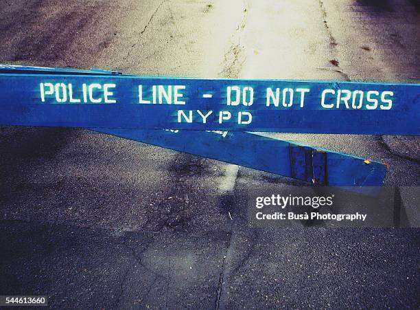 police line - do not cross nypd fence in the streets of new york city, usa - row police stock pictures, royalty-free photos & images