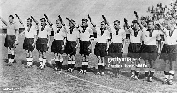 World Cup in Italy First round match in Florence, Italy: Germany 5 - 2 Belgium. The German line-up showing the Hitler salute, from the left:...