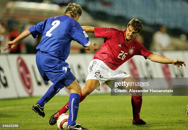 Sebastian Deisler of Germany challenges for the ball with Vratislav Gresko of Slovakia during the friendly match between Slovakia and Germany at the...