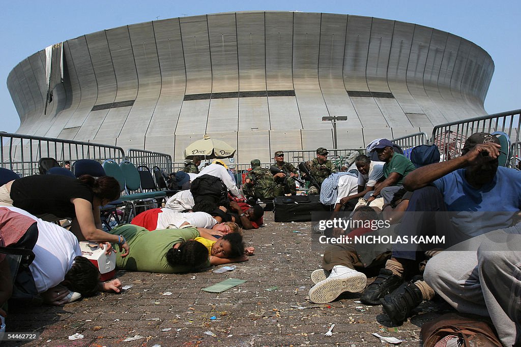 People waiting to be evacuated from the