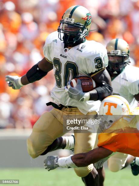 Corey White of UAB is brought down by Jason Allen of Tennessee on September 3, 2005 at Neyland Stadium in Knoxville, Tennessee. The Volunteers...