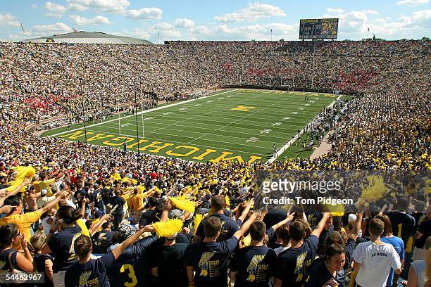 Michigan fans cheer prior to the start of the home opener against Northern Illinois at Michigan Stadium on September 3, 2005 in Ann Arbor, Michigan.