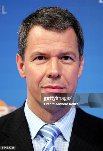 Television presenter Peter Kloeppel attends a photocall in advance of the upcoming television debate to be held on September 4, with German...