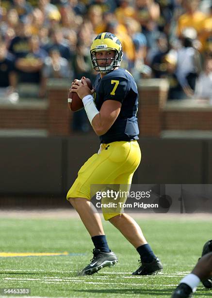 Chad Henne of Michigan drops back to pass against Northern Illinois at Michigan Stadium on September 3, 2005 in Ann Arbor, Michigan. Michigan won the...