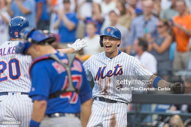 July 02: Brandon Nimmo of the New York Mets shows his delight on scoring off Neil Walker of the New York Mets two run first inning homer during the...