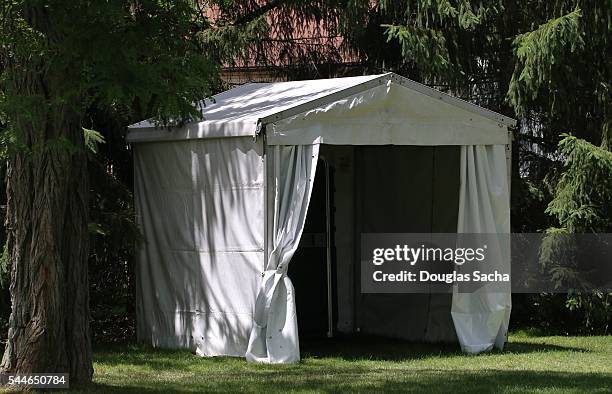 hidden portable toilet in a white tent - canopy tent stock pictures, royalty-free photos & images