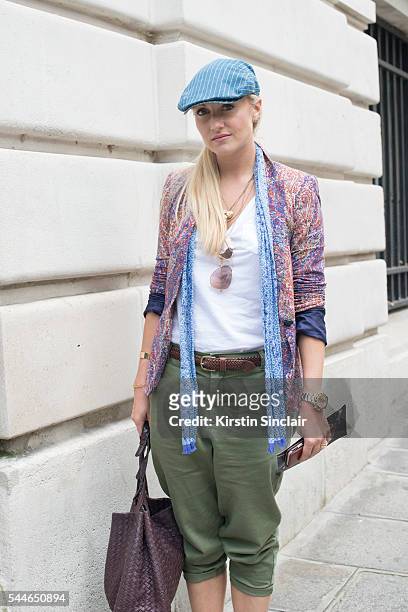 Fashion Director at The Rake Magazine Sarah Ann Murray wearing a Zara top and trousers, Ralph Lauren hat, Anderson and Sheppard scarf and Bottega...