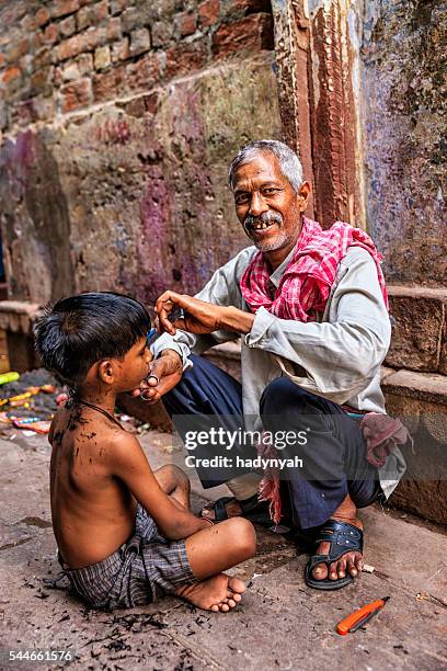Hairdresser Cutting Boys Hair On The Streets Of Varanasi India High-Res Stock Photo - Getty Images Hairdresser Cutting Boys Hair On The Streets Of Varanasi India High-Res Stock Photo - Getty Images