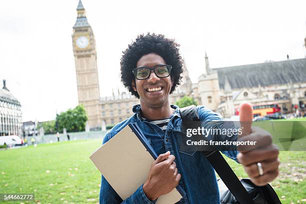 student in london - big ben black and white stock-fotos und bilder