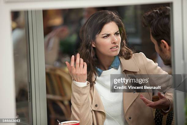 couple arguing in a cafe - angry face stock-fotos und bilder