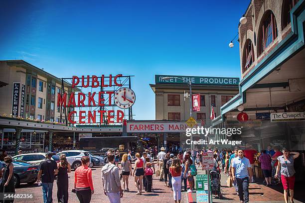 outside at pikes place market in seattle - seattle market stock pictures, royalty-free photos & images