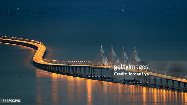 penang second bridge during blue hour - penang malaysia stock pictures, royalty-free photos & images