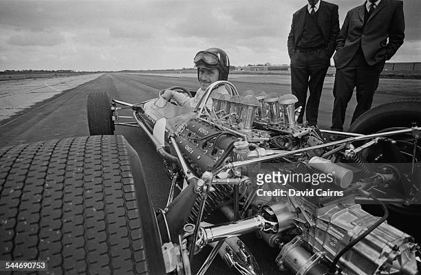 British racing driver Graham Hill in the driving seat of the new Lotus with Cosworth DFV engine, 22nd May 1967.