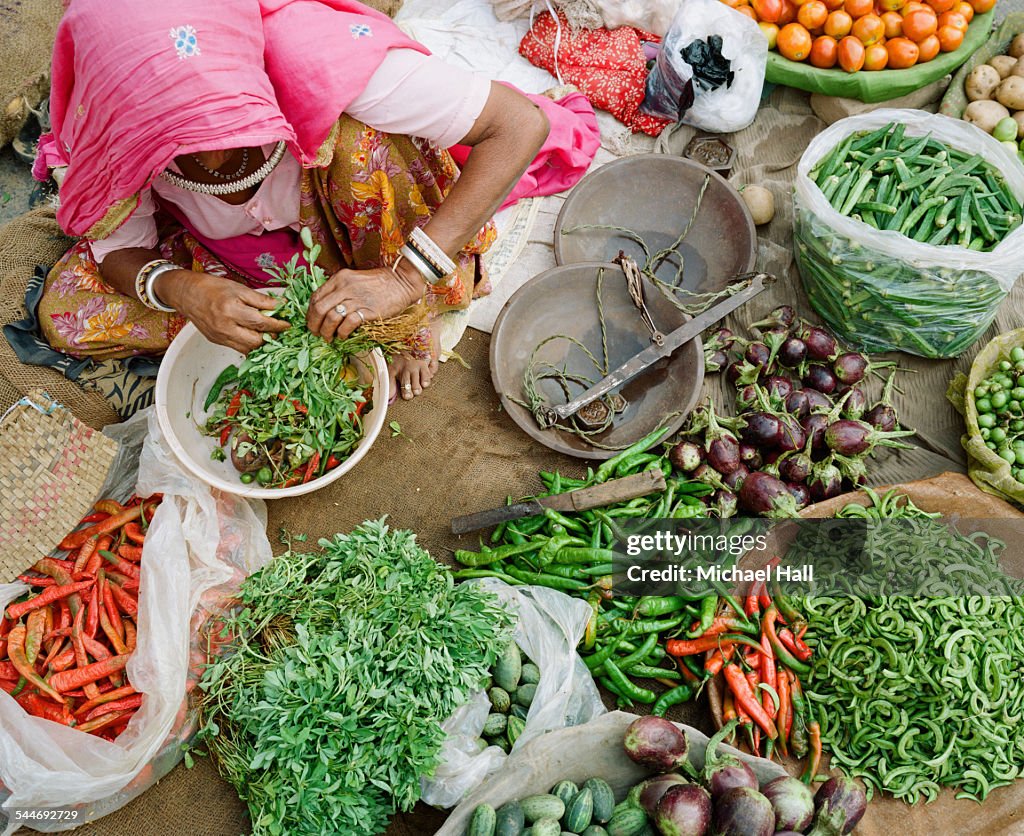 Woman with produce at market