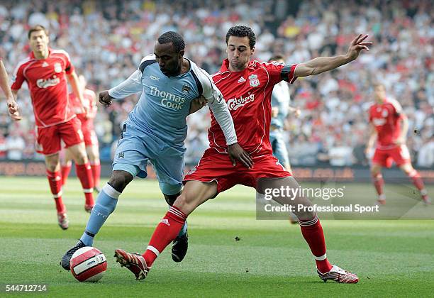 Darius Vassell of Manchester City and Alvaro Arbeloa of Liverpool in action during the FA Premier League match between Manchester City and Liverpool...