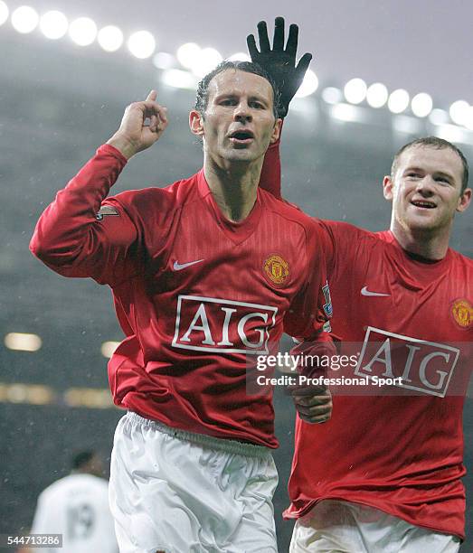 Ryan Giggs and Wayne Rooney of Manchester United celebrate during the FA Premier League match between Manchester United and Derby County at Old...