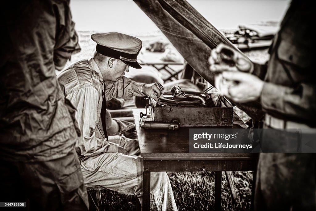 Naval Officer Enjoying The Music On His Vintage Phonograph