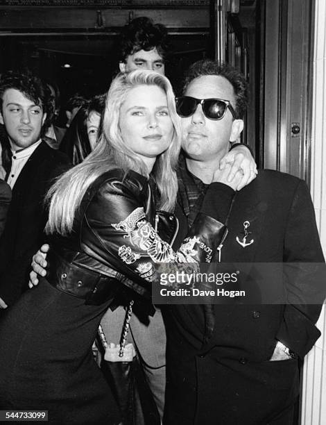 Model Christie Brinkley and her husband, musician Billy Joel, at a nightclub in London, October 25th 1989.