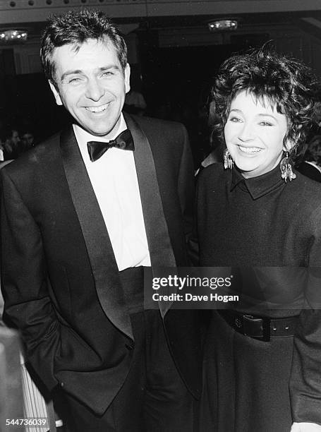 Musicians Peter Gabriel and Kate Bush attending the BPI Awards after winning in their categories, London, February 10th 1987.