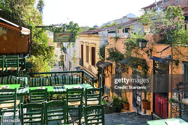 plaka neighborhood in athens, greece - plaka greek cafe stock pictures, royalty-free photos & images